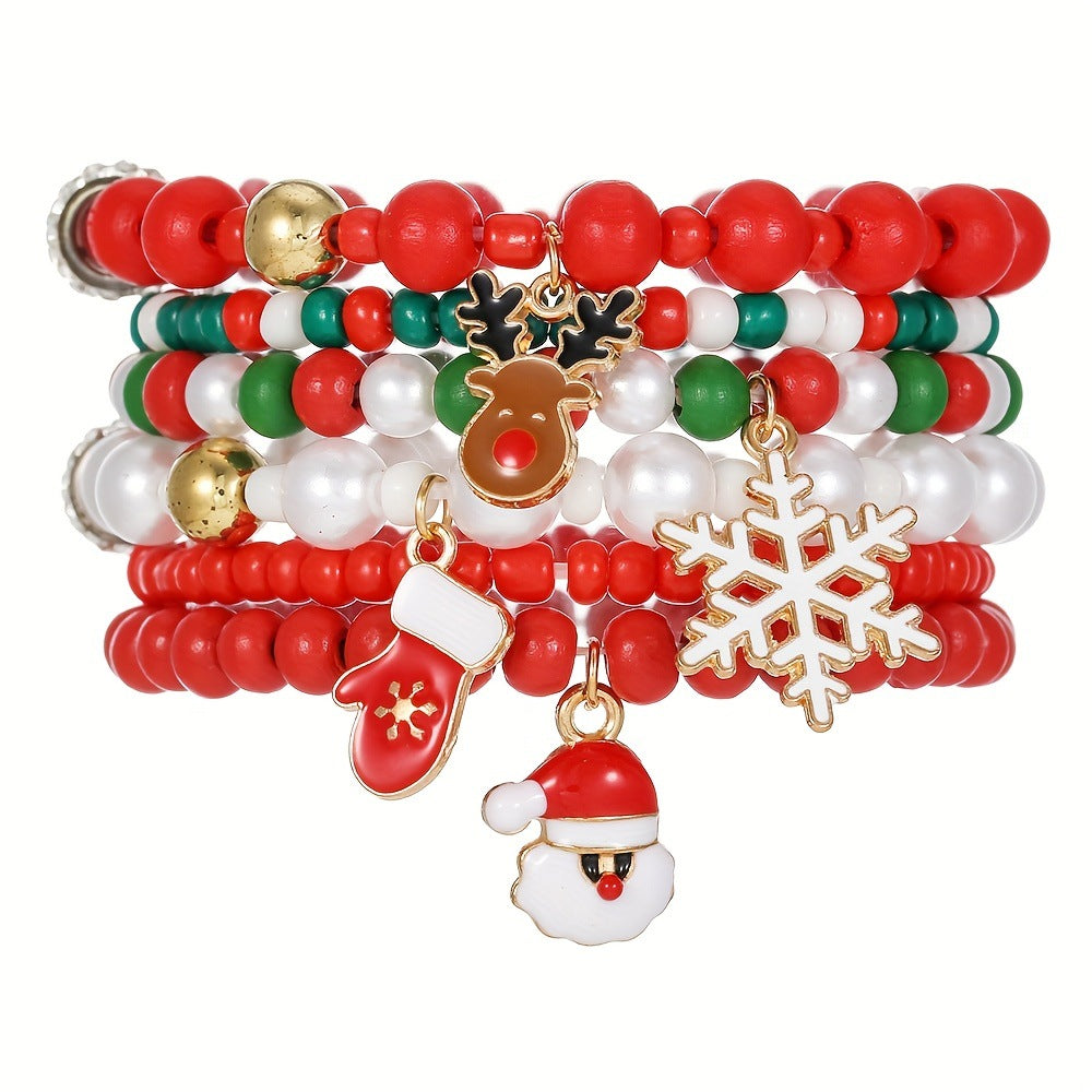 Christmas bracelet set with reindeer bells, Christmas tree beads, and woven polymer clay.